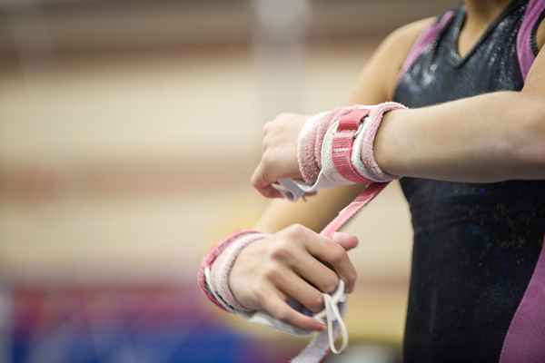 A ginástica pratica o que embalar em sua bolsa de ginástica