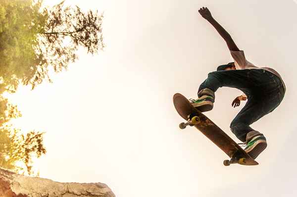 Guida passo-passo alla perfetta TRE Flip su uno skateboard